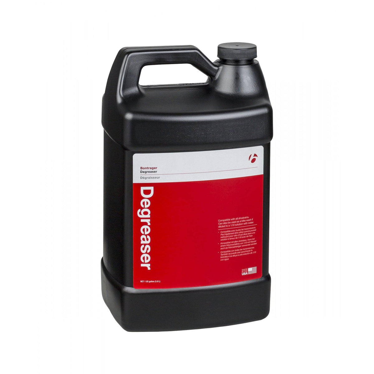 Bontrager bike degreaser and lubricant cleaner with citrus scent for drivetrain maintenance, shown in a workshop setting.