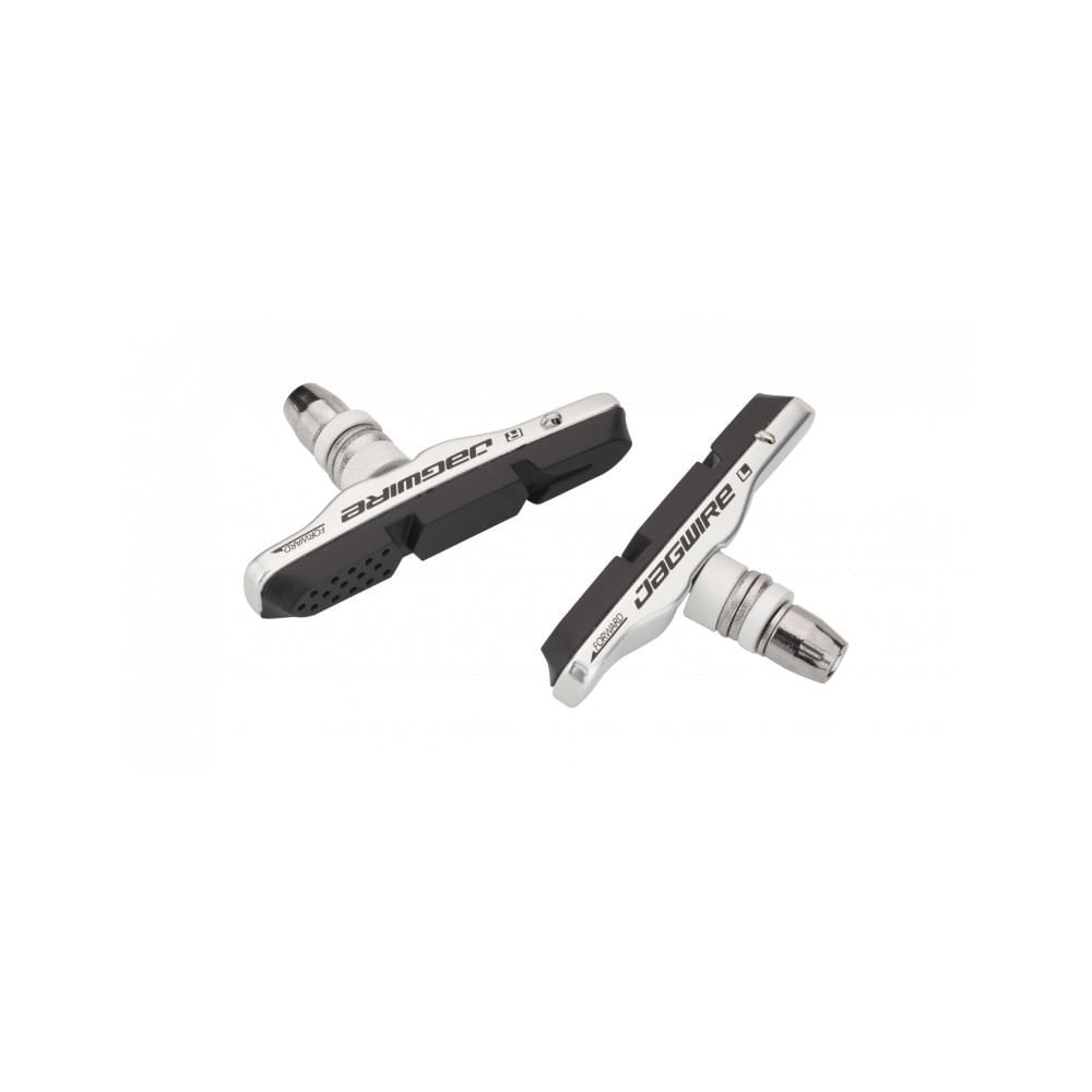 Jagwire Mountain Pro brake pads for linear pull and cantilever MTB brakes, close-up of components on a bicycle.