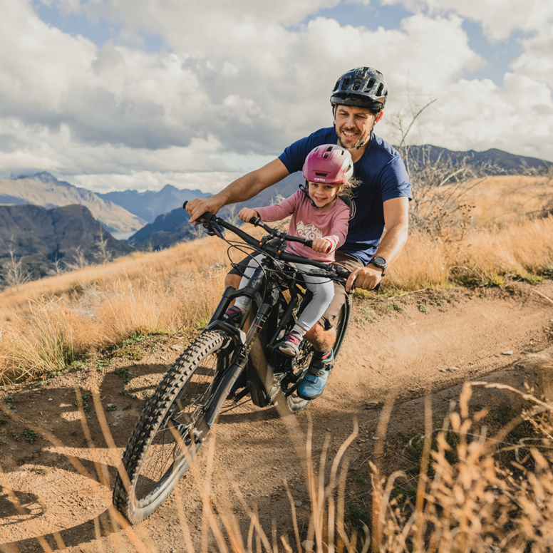 Kids Ride Shotgun Pro Evo 2-in-1 child bike seat and handlebars combo in black, designed for safe and comfortable riding.