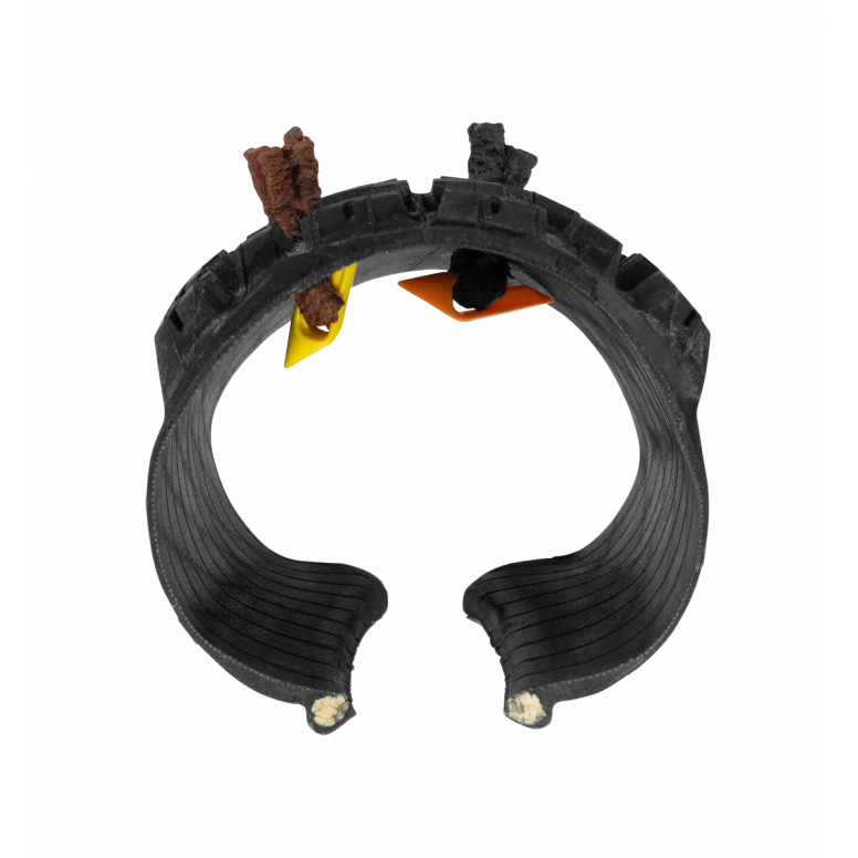 Crankbrothers Plug Mate tubeless tyre repair kit with reusable anchors and plugs for workshop use, displayed with tools and accessories.