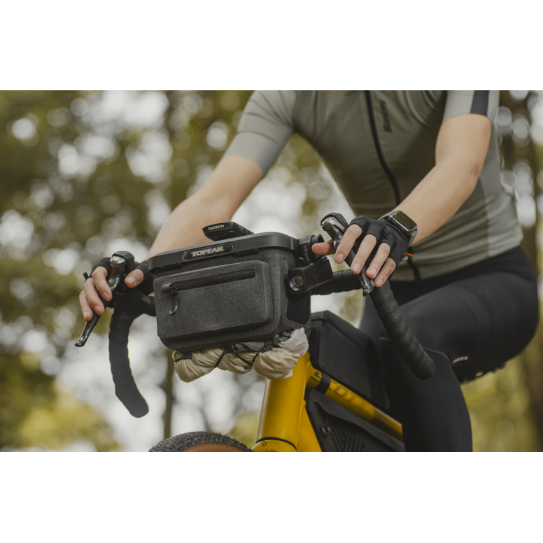 Topeak Elementa Dry Bag handlebar bag with weatherproof design and multi-mount adaptor for cycle computers and cameras.