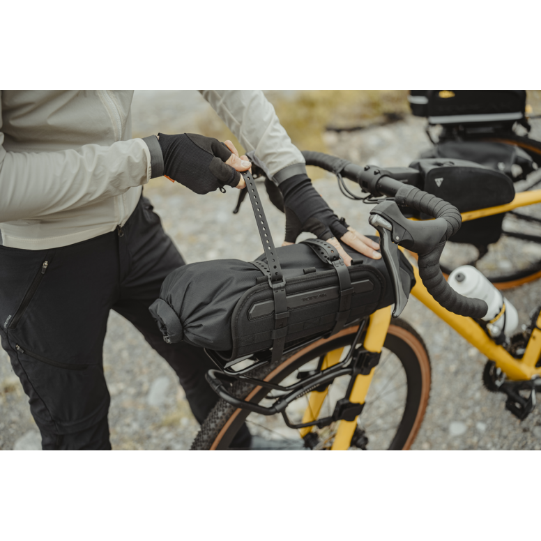 Topeak Rackloader 12L weatherproof bike rack bag with adjustable straps, designed for secure cycling storage.