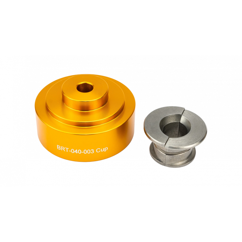 Enduro Bearings BRT-040-BB86/92 adapter cup and puller for press-fit bearings, shown in a workshop setting.
