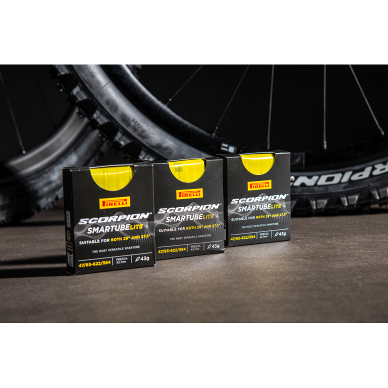 Pirelli Scorpion SmarTUBE Lite TPU inner tube for gravel and MTB wheels, shown installed in a bike tire.