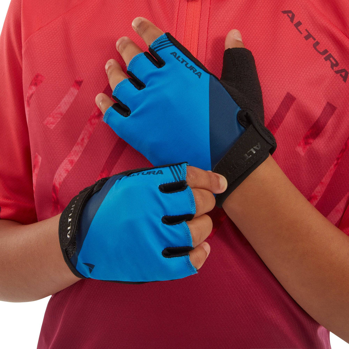 Altura Kids Airstream cycling mitts gloves with grip and comfort features, designed for young cyclists, showing the padded palms and bright color.