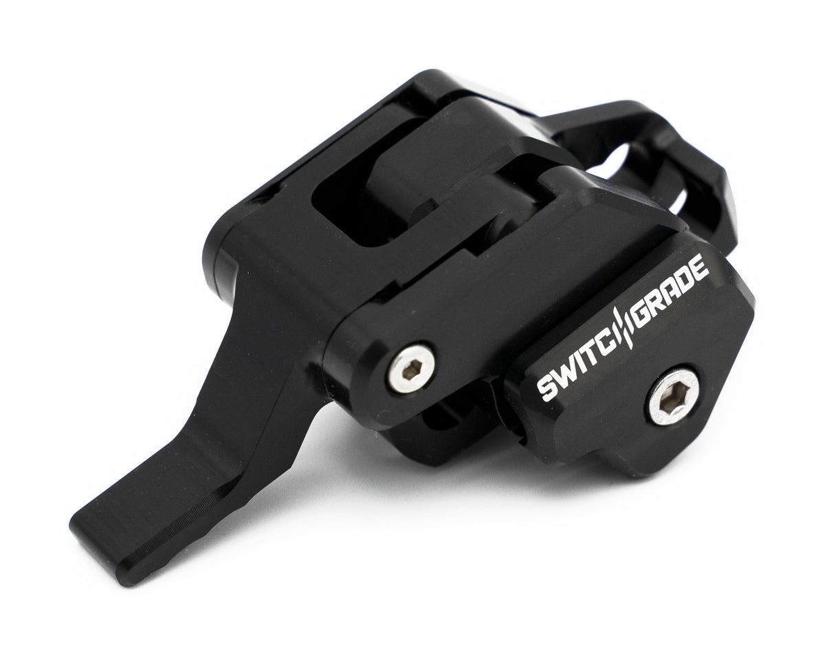Aenomaly SwitchGrade 2.0 EVO bike saddle angle adjustment switch component showing the compact, adjustable switch mechanism.