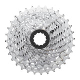 MicroSHIFT H-Series 11-speed road bike cassette with 11-34T steel chrome-plated gears, shown mounted on a bike drivetrain.