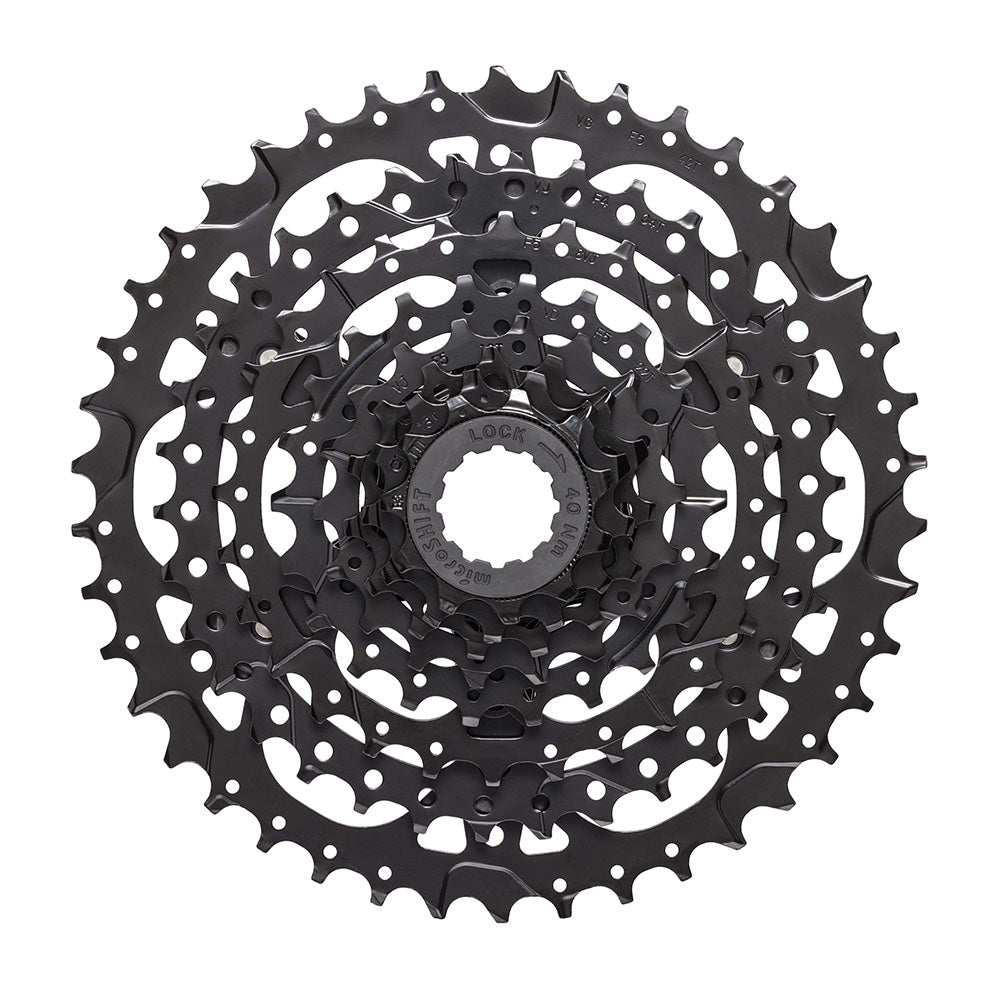 MicroSHIFT Acolyte H-Series 8-speed cassette with multiple gear options, showing the sleek metal gear cogs and branding.