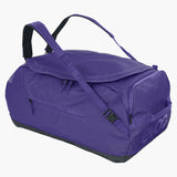 EVOC 60L Duffle Bag showing durable black fabric, zipper closure, carrying handles, and compact design for travel and accessories.