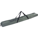 EVOC padded ski and pole travel bag for secure transport, designed for skis and accessories with durable, padded construction.