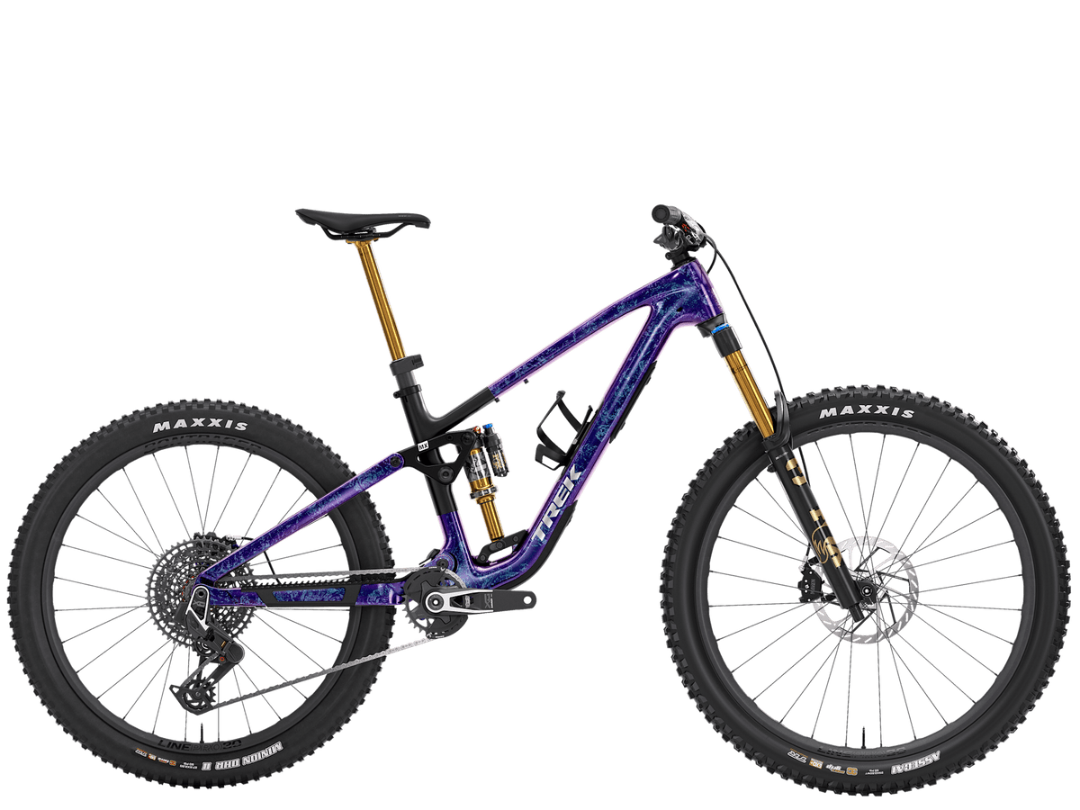 Trek Fuel MX 9.9 X0 AXS Gen 7 mountain bike with full suspension, high-performance trail bike, electronic shifting, and rugged tires.