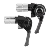 MicroSHIFT MT bar end shifters for mountain bike rear derailleur with indexed and friction modes, mounted on handlebars.