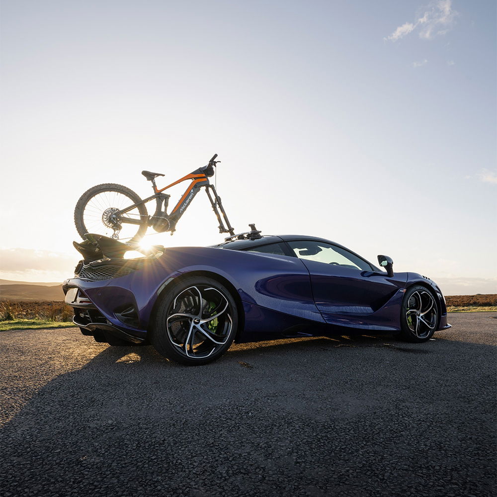 SeaSucker Bomber 3 Bike Rack with HUSKE Fork Mount Vacuum System attached to a vehicle for secure bike transport.