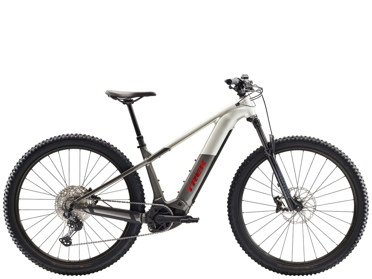 Trek Powerfly+ 6 Gen 5 electric mountain bike with 29-inch wheels and Shimano Deore XT drivetrain, ready for off-road adventure.