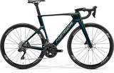 Merida Reacto 5000 road bike 2027 with Shimano 105 Di2 electronic shifting, green and gray frame, sleek aerodynamic design.