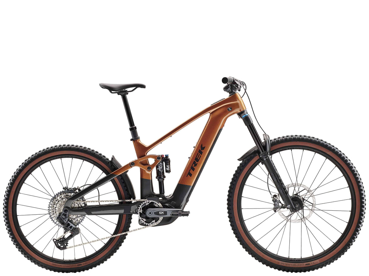 Trek Rail+ 9.8 GX AXS 2025 electric mountain bike with 29-inch wheels and Gen 5 motor, black frame and suspension.