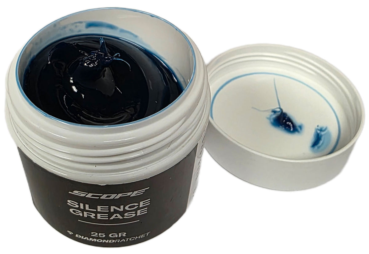 Scope Cycling ARTECH SILENCE GREASE blue bike lubricant for reducing noise and friction in workshop maintenance.