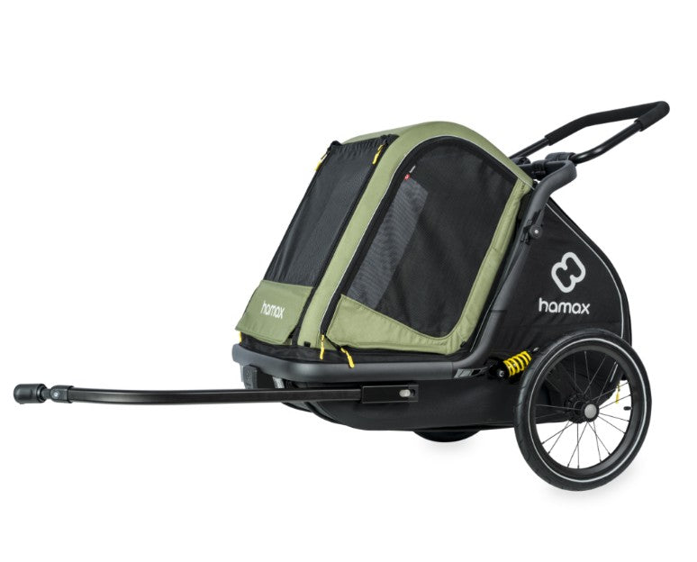 Green Hamax Pluto Medium Dog Trailer 2023 with bike trailer and stroller kit, showcasing the durable, enclosed dog transportation accessory.