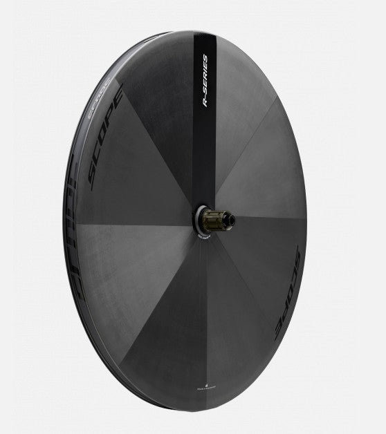 Scope Cycling R-Series V2 TT Disc Wheel for time trial and triathlon racing, showing sleek aerodynamic design and disc surface.