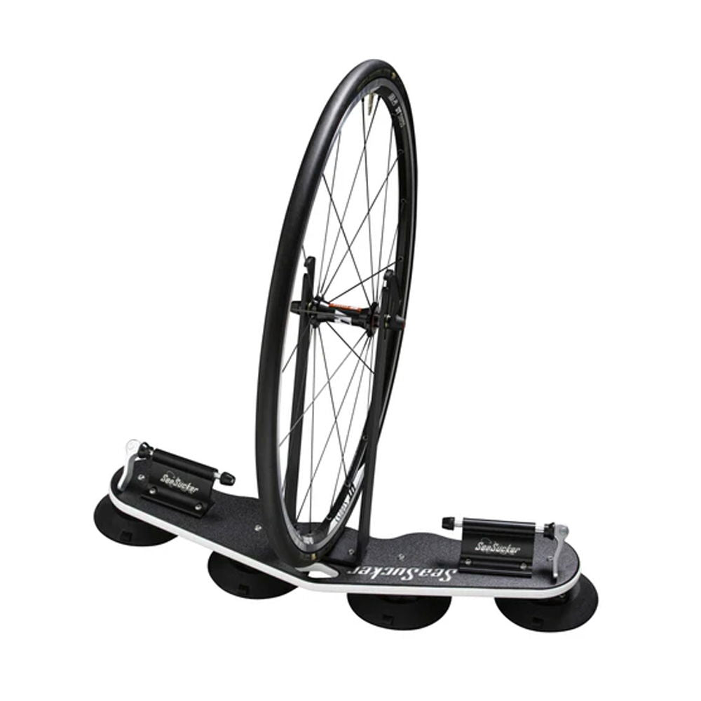 SeaSucker add-on front wheel holder for Bomber and Mini Bomber bike racks, showing mounted wheel and secure attachment.