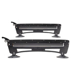 SeaSucker Classic Ski Rack vacuum mount holding four pairs of skis and snowboards for roof storage accessories.