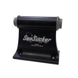 Pair of SeaSucker 12x100mm HUSKE fork mount plugs in silver for bike transport accessories, shown mounted on a bike fork.