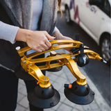 SeaSucker Komodo 1 Bike Rack for sports cars and convertibles, compact roof mount installed on a sleek vehicle in a lifestyle setting.