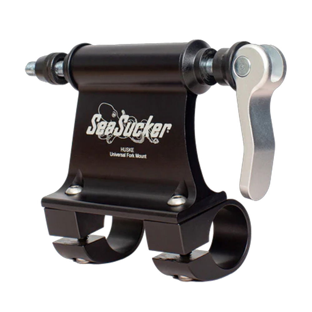SeaSucker Monkey Bars bike carrier with 9mm quick release fork mount, shown mounted on vehicle roof for secure bike transport.