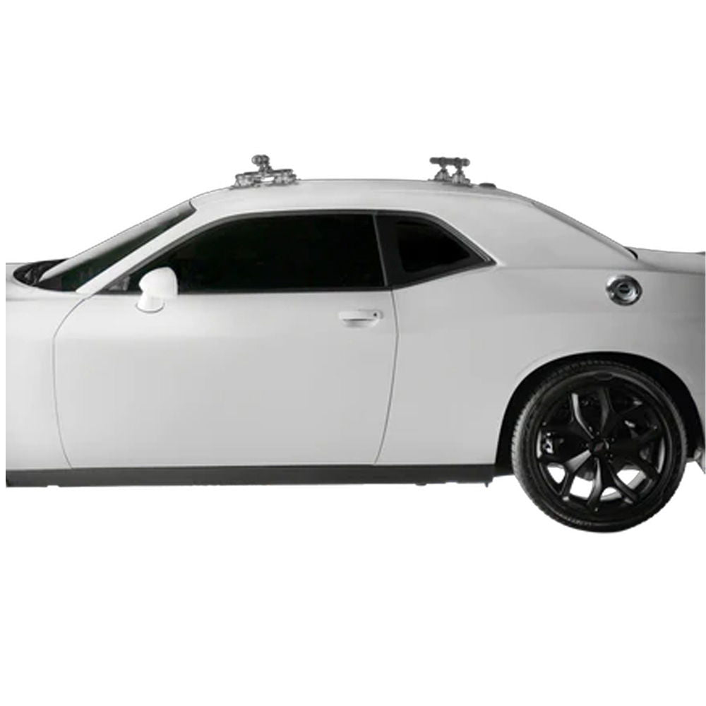 SeaSucker Monkey Bars 60-inch roof cross-bar system for outdoor gear transport, shown mounted on vehicle roof side view.