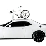 SeaSucker Talon 1 bike rack with HUSKE fork mount, vacuum cup carrier attached to car roof, showing side view of the accessories.