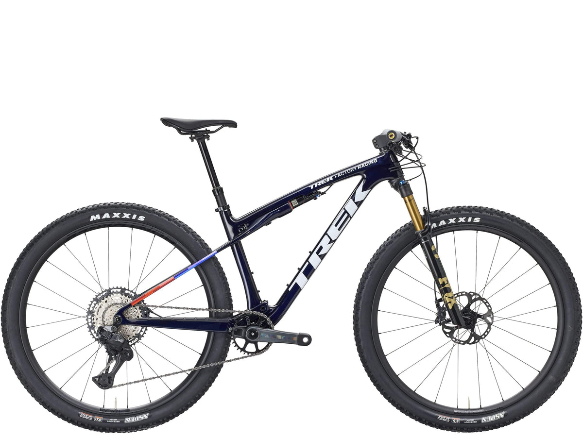 Trek Supercaliber SLR 9.8 XT Di2 mountain bike with IsoStrut suspension, black frame and advanced gear system.