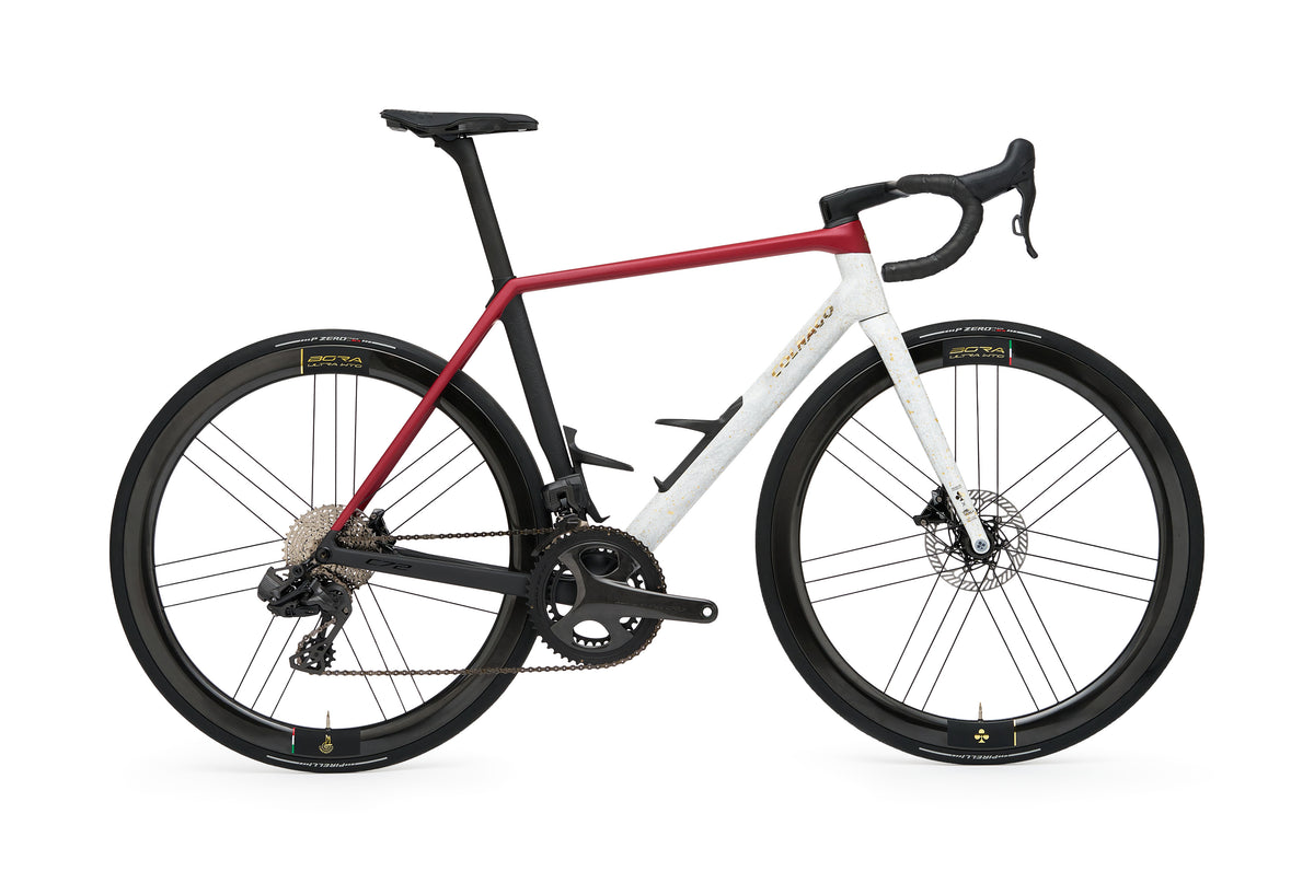 Colnago C72 Disc La Scala Limited Edition carbon road race bike with Dura-Ace Di2 shifters on a studio background.