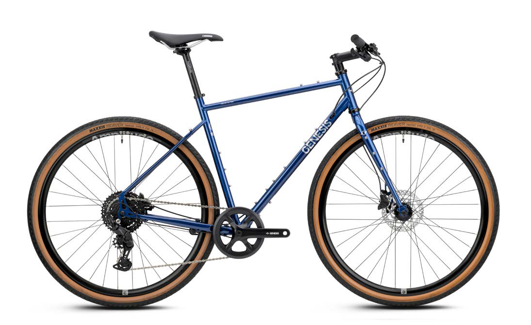 Genesis Croix de Fer 10 flat bar gravel bike with Shimano 1x9-speed drivetrain and hydraulic brakes, shown in a detailed side view.