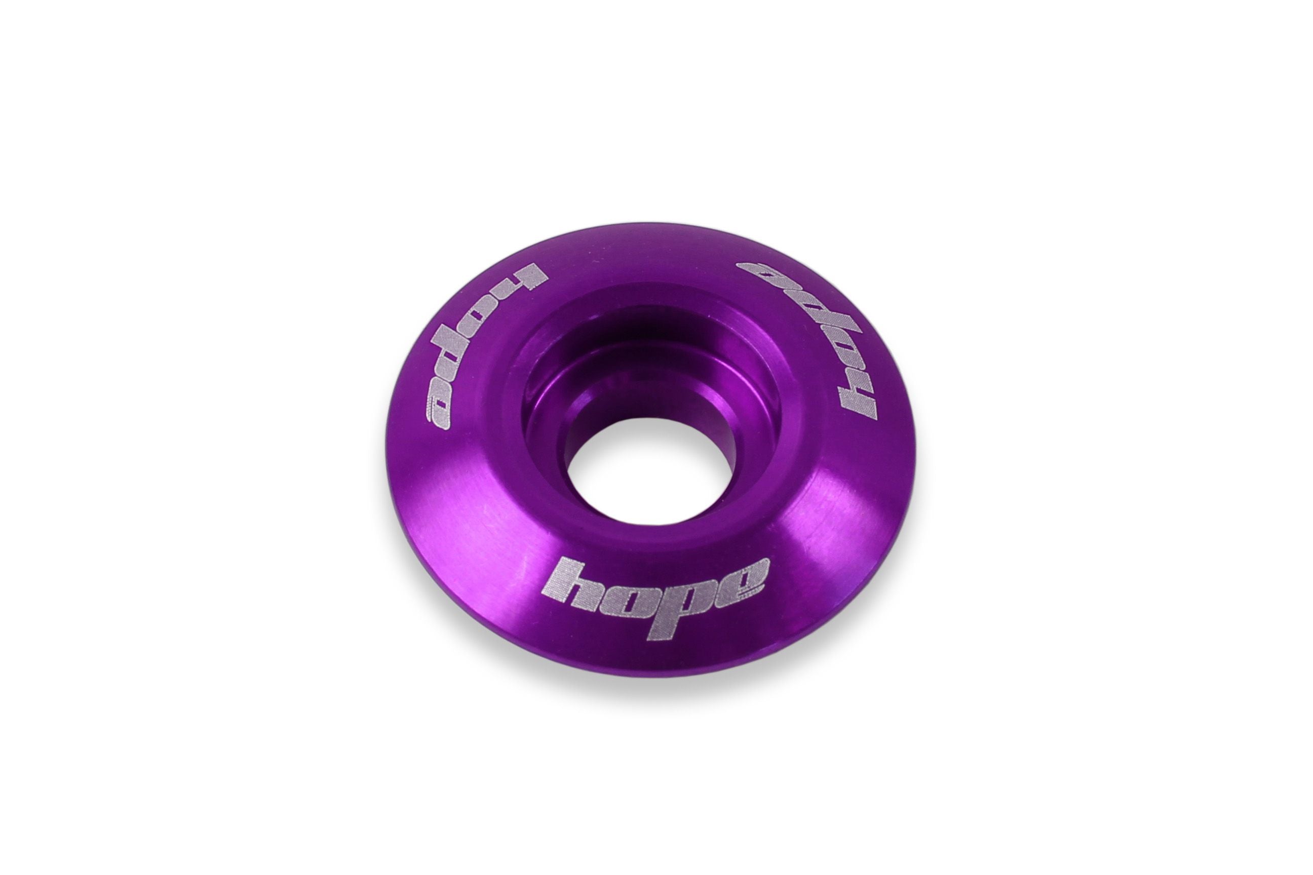 Hope headset top cap in durable purple for bike headsets, featuring a secure fit and high-quality components.