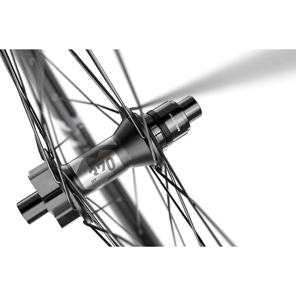 DT Swiss F 1900 27.5-inch MTB front wheel with 30mm rim and 110x15mm BOOST axle, detailed view of wheel components.