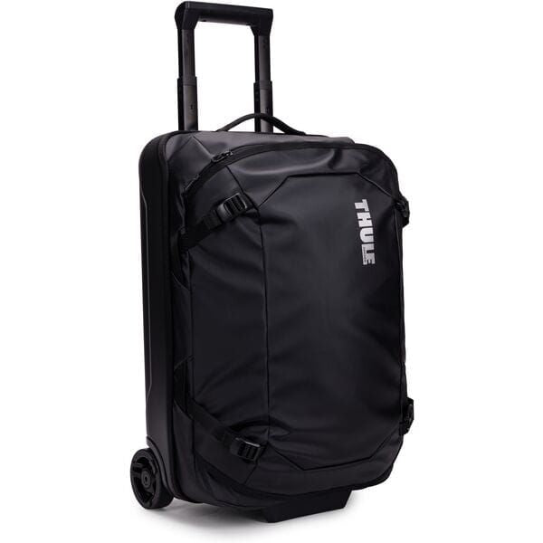 Black Thule Chasm Carry On wheeled suitcase with durable design and oversized wheels, ideal for travel accessories.