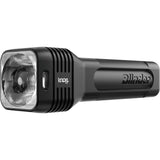 Knog Blinder 120 StVZO front bike light with USB-C recharge port, urban commuter design, mounted on a bike handlebar.