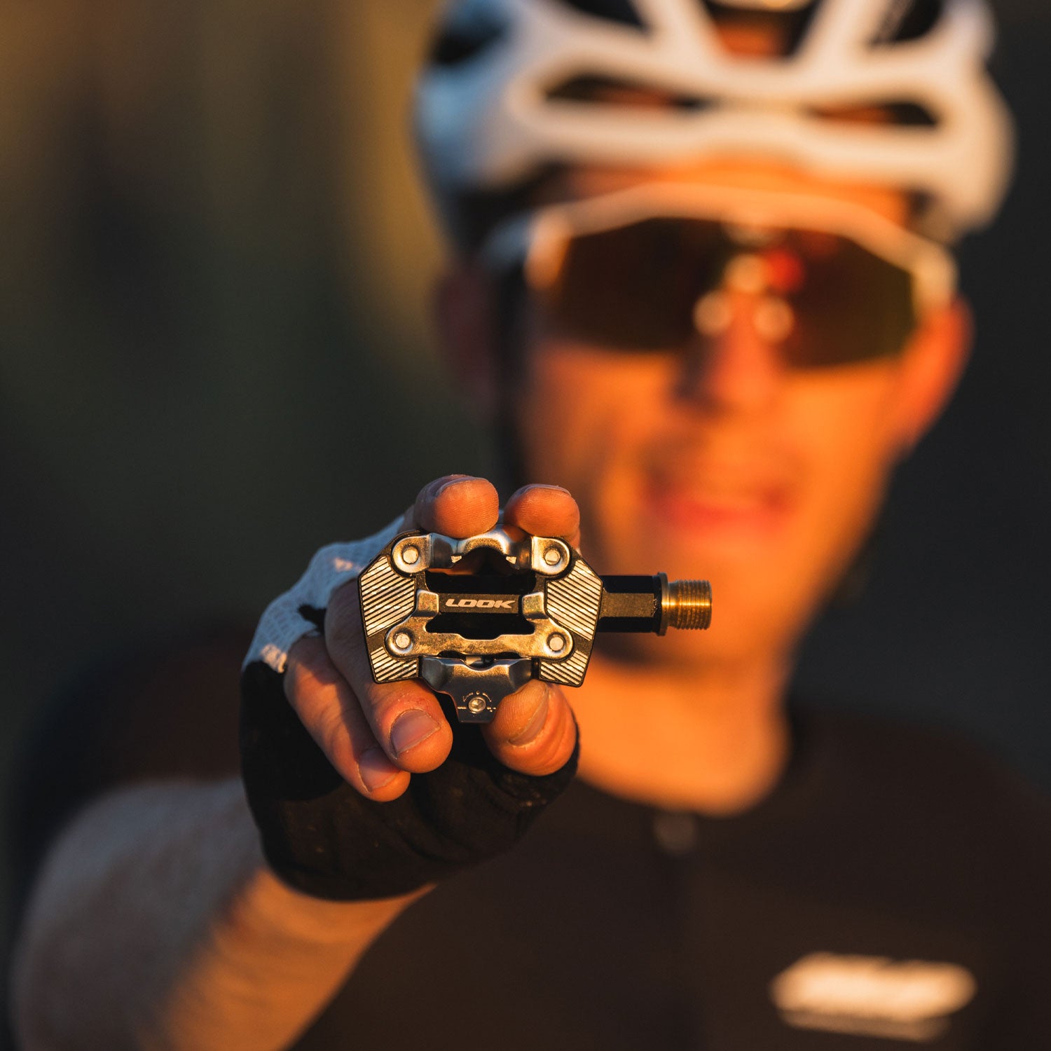 Look X-One-G Ti gravel racing pedals with SPD compatibility and adjustable tension, featuring lightweight titanium construction.