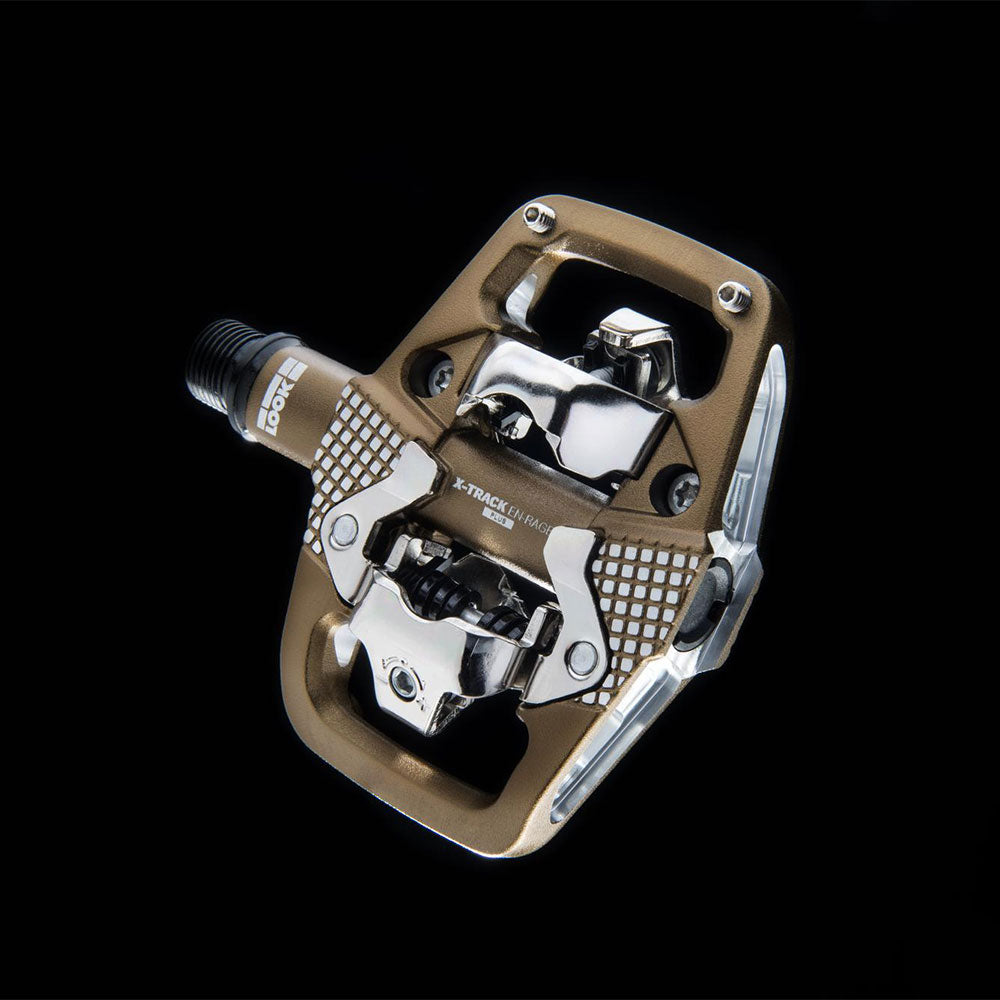 Look X-Track EN-Rage Plus bronze MTB pedals with SPD compatibility, featuring enduro clipless design for mountain biking.