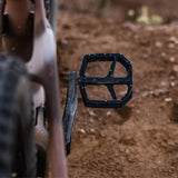 Look Trail Roc Plus flat MTB pedals with adjustable pins, durable components for mountain biking performance.