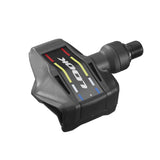 Look Keo Blade road bike pedals with aerodynamic design and wide platform, showcasing sleek metal construction and clipless mechanism.