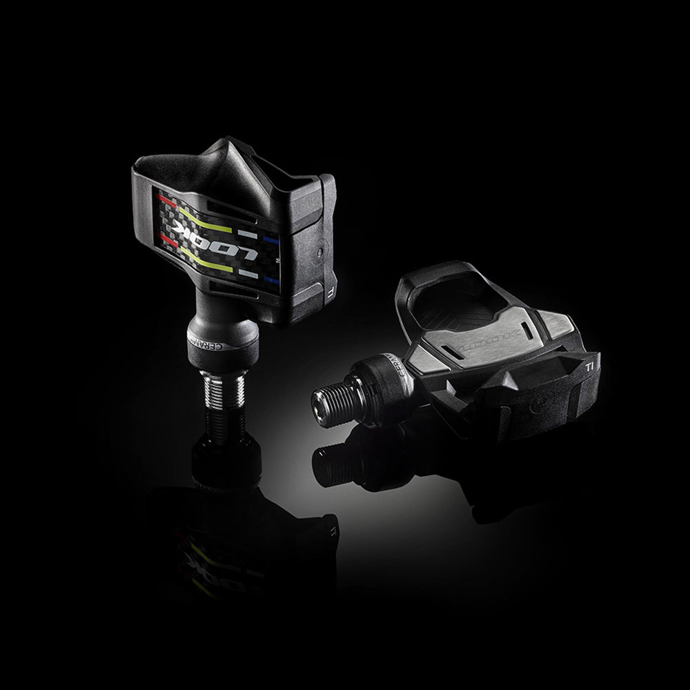 Look Keo Blade Ti ceramic road bike pedals with 12° tension, 56mm Q-Factor, lightweight titanium construction, mounted on a bike.