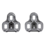 Look Keo Grip Cleats with Silent Float Technology for enhanced cycling performance, shown on a bicycle pedal.