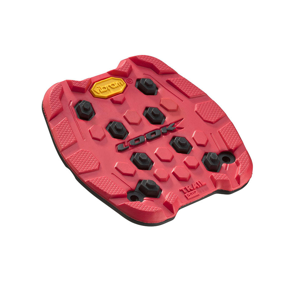 Look Trail Grip Pads with VIBRAM Activ Grip Technology for off-road bike pedals, featuring durable rubber components for enhanced traction.