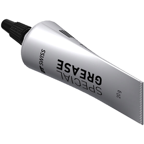 DT Swiss Molykote TP 42 special grease for ratchet systems, showing a container of premium lubricant used in workshops.