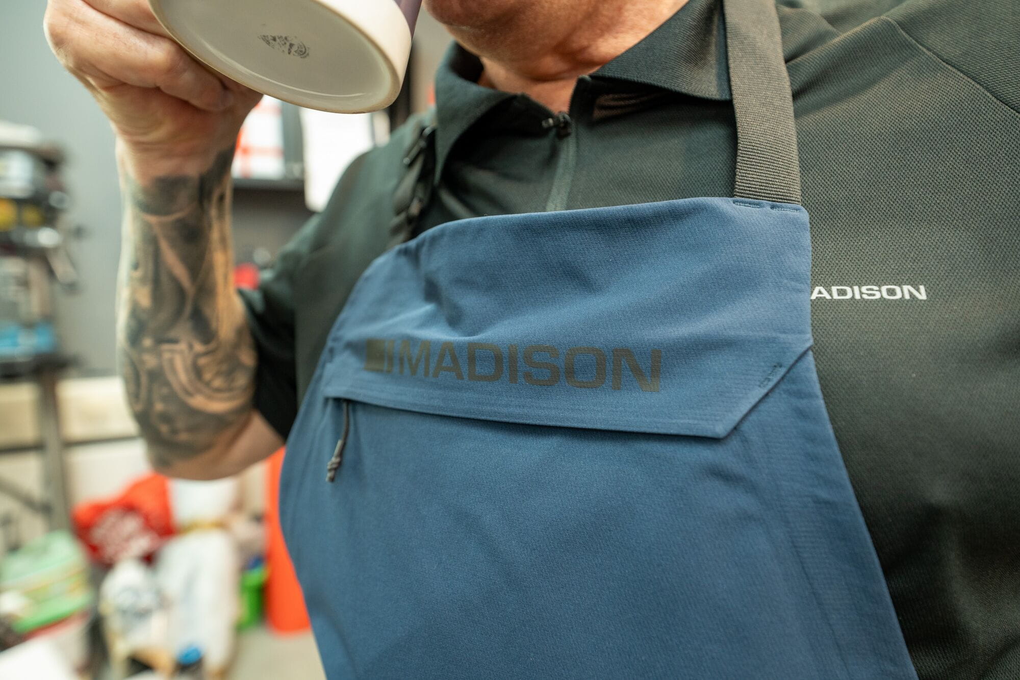 Madison Roam Blue Workshop Apron with adjustable waist and multiple tool pockets, ideal for woodworking or crafting projects.