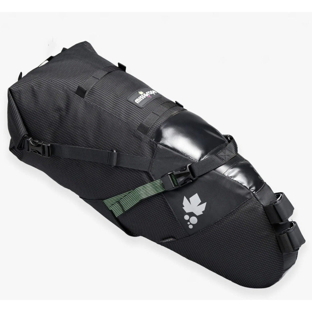 Miss Grape Cluster 20 Adventure waterproof saddle bag attached to bike saddle for bikepacking, featuring durable outdoor gear design.