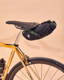Miss Grape Cluster 2 Road waterproof saddle bag with 2-liter capacity attached to bike saddle for cycling accessories.