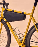Miss Grape Internode 3 Road waterproof frame bag attached to a cycling bike, designed for gravel and cycling adventures.