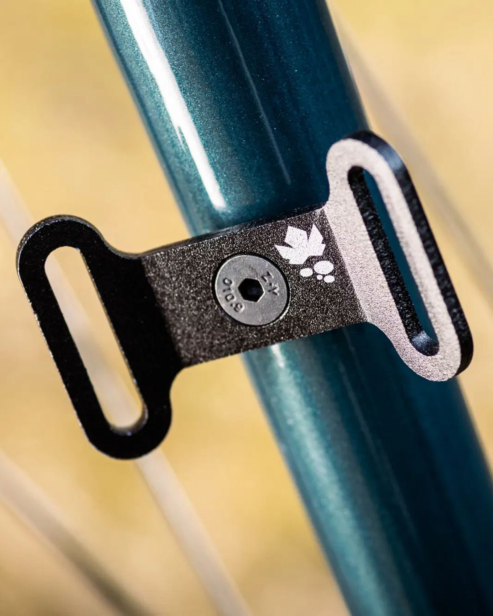 Miss Grape Orecchiette Cage Boss for bike packing, secure lashing points, durable bike accessories for reliable cargo attachment.